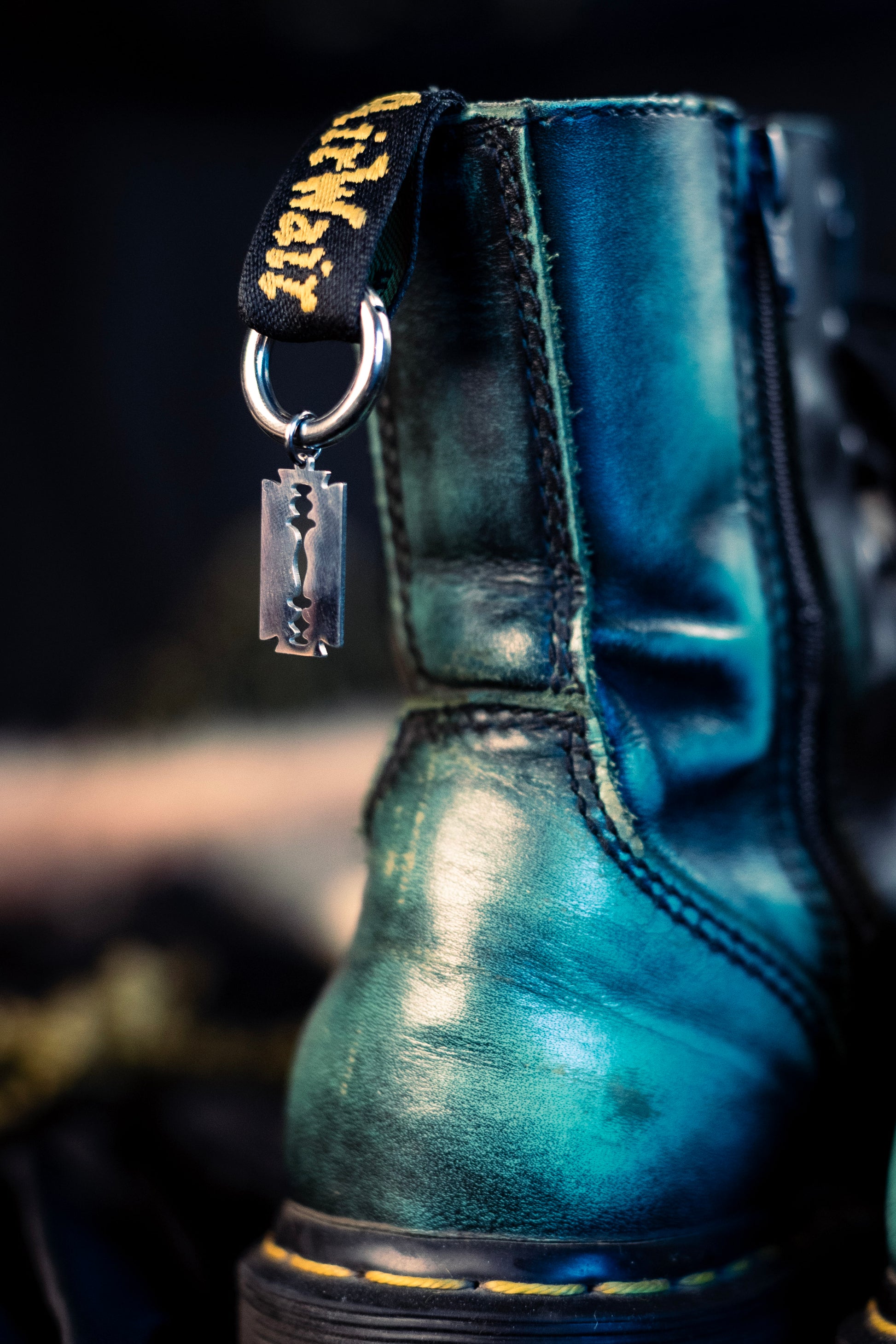 razor blades shoe charms with a stainless steel  hoop clasp 