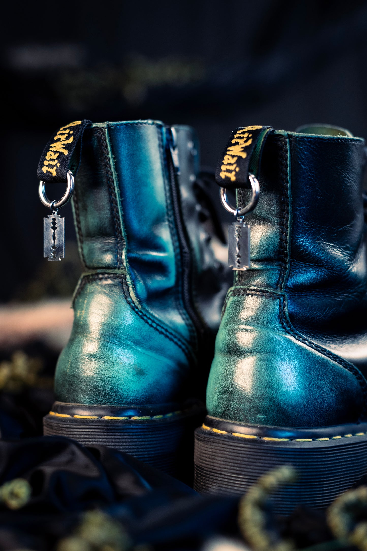 razor blades shoe charms with a stainless steel  hoop clasp 