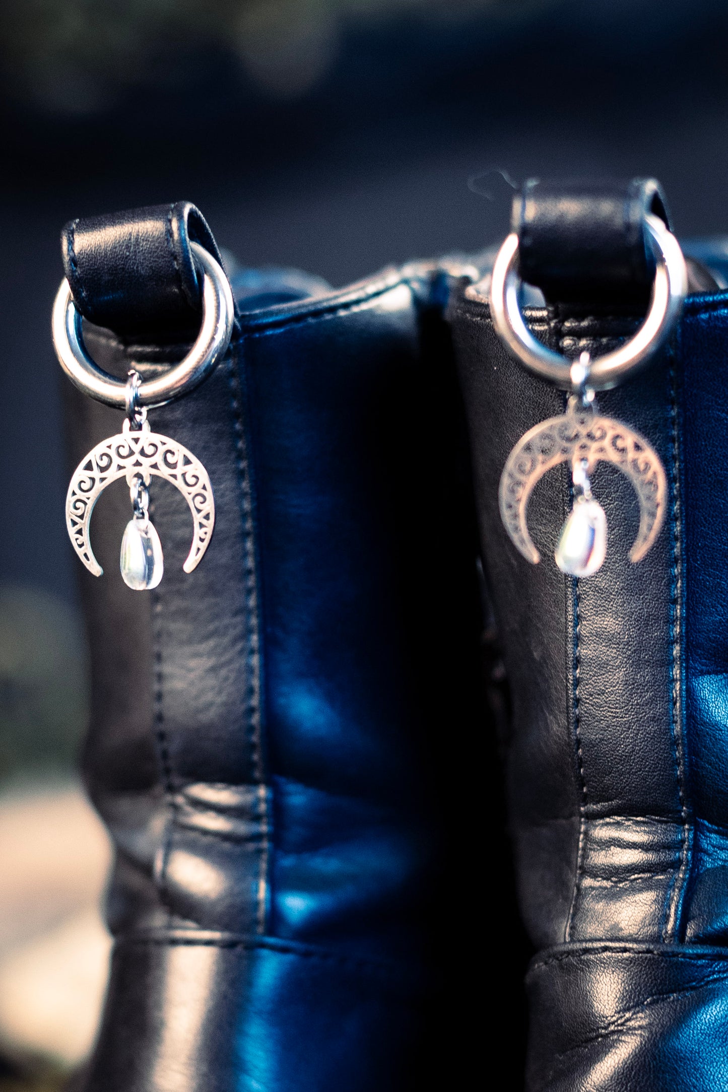 moon shoe charms featuring an iridescent glass bead and a stainless steel  hoop clasp 