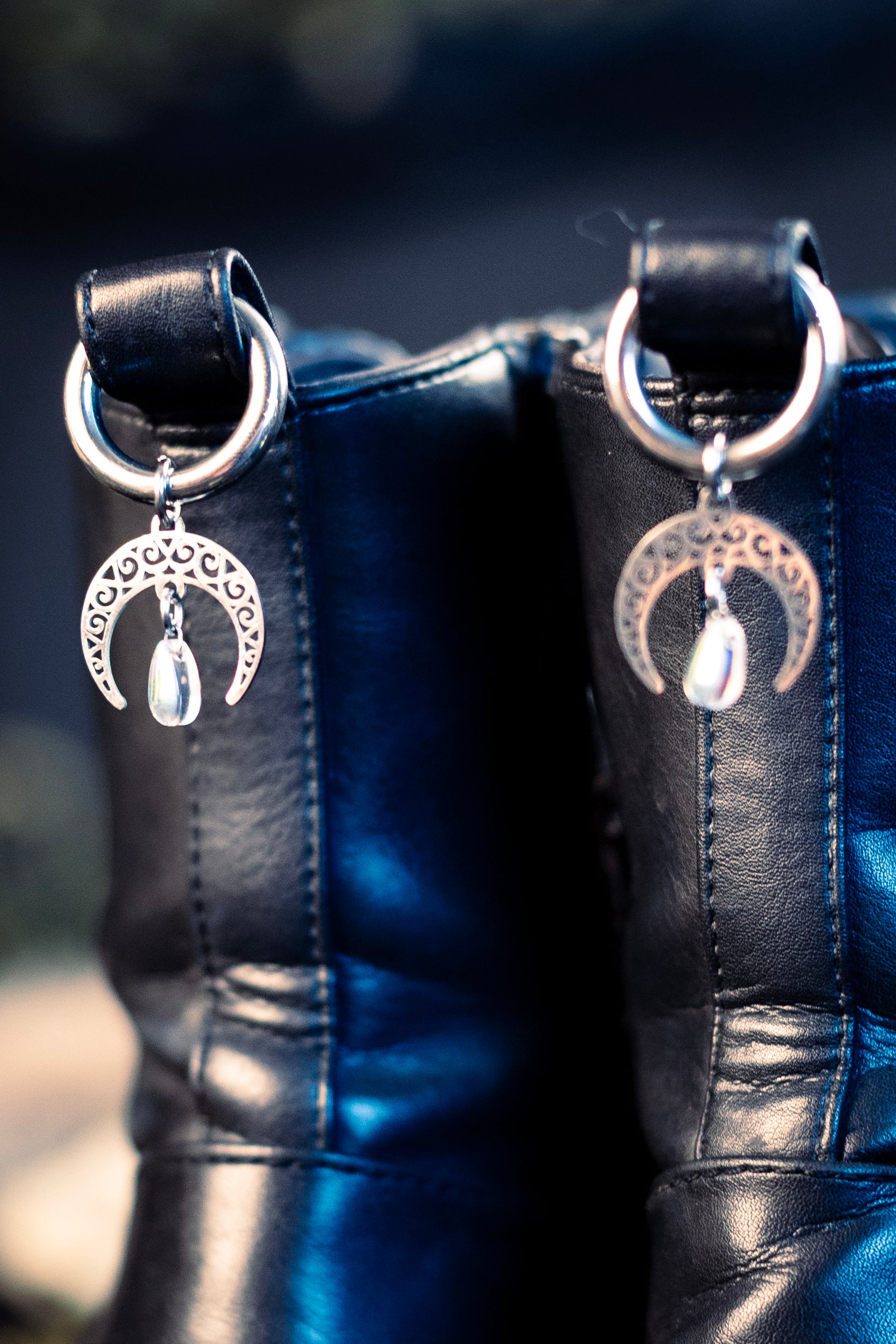 moon shoe charms featuring an iridescent glass bead and a stainless steel  hoop clasp 
