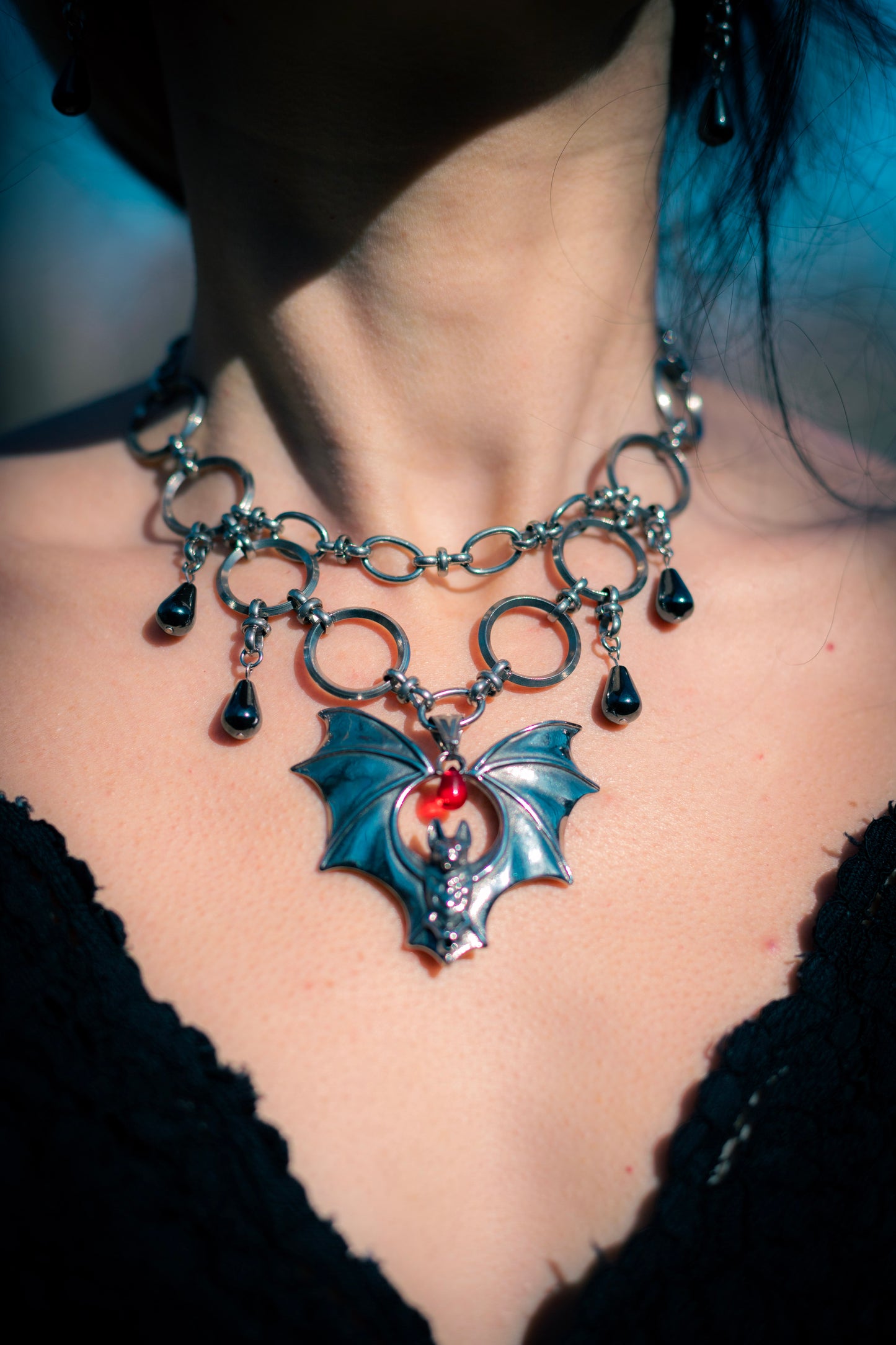 DRUSILLA | Stainless steel Chainmail necklace with bat and red bead